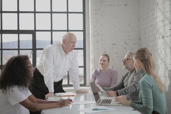group of people photo in room